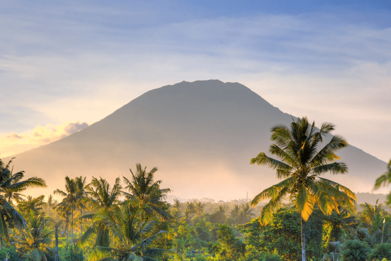 Mount Agung visable in the distance. Mount Agung is both a mountain and volcano