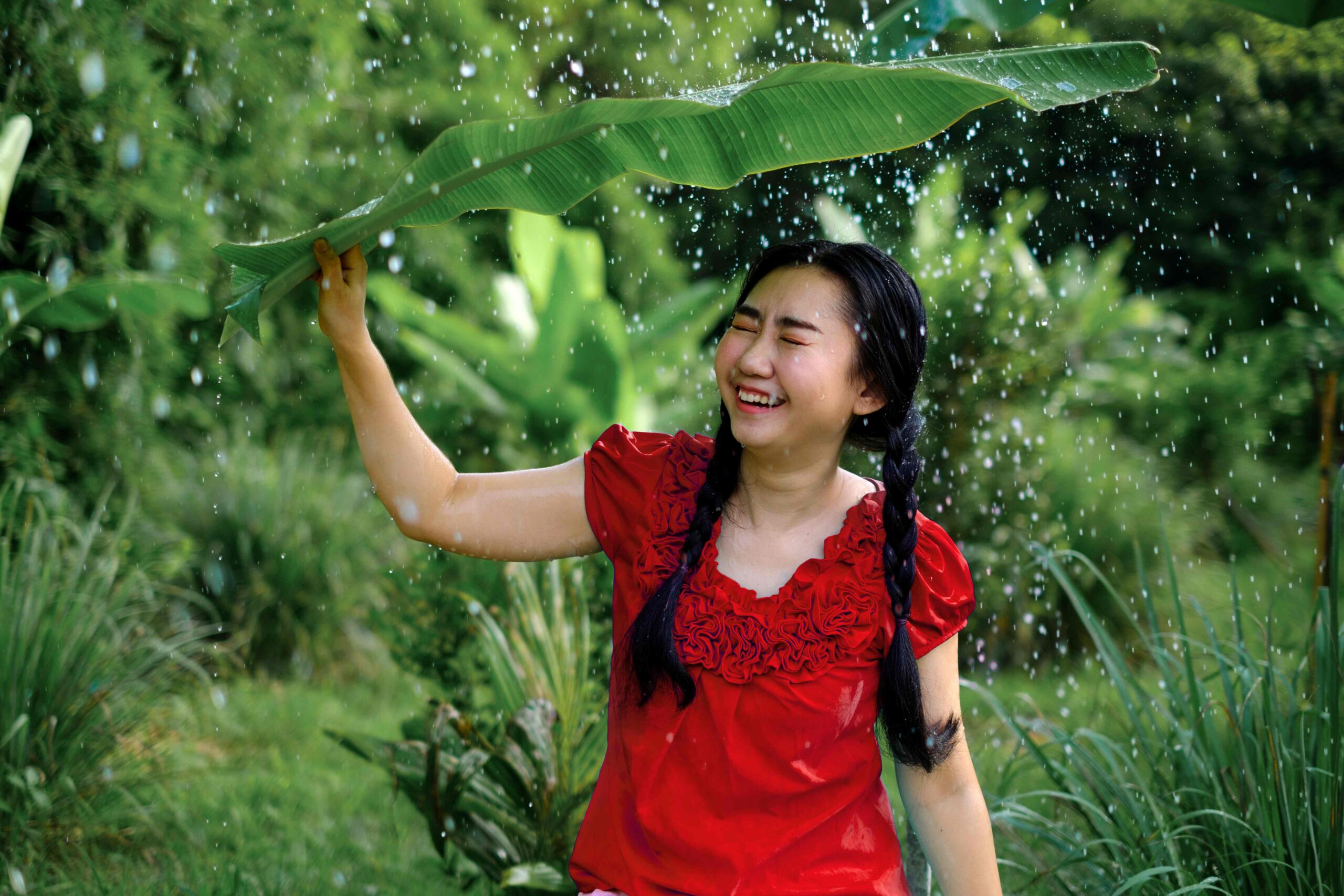 portrait of a young asia woman was under a banana 2026 01 07 23 41 43 utc