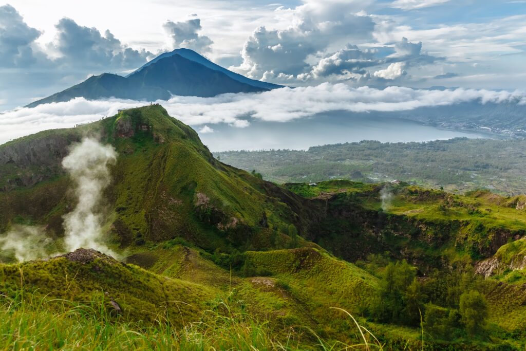 Active Indonesian volcano Batur in the tropical island Bali. Indonesia. Batur volcano sunrise serenity. Dawn sky at morning in mountain. Serenity of mountain landscape, travel concept