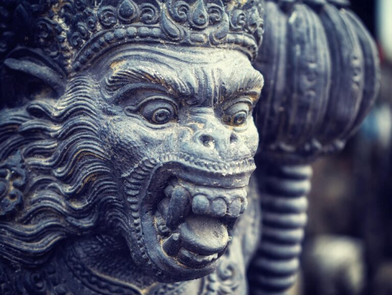 Ancient Balinese statue at the temple in Bali