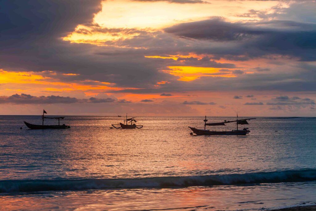 Bali, Indonesia Fishing boats at sunset Travel landscape
