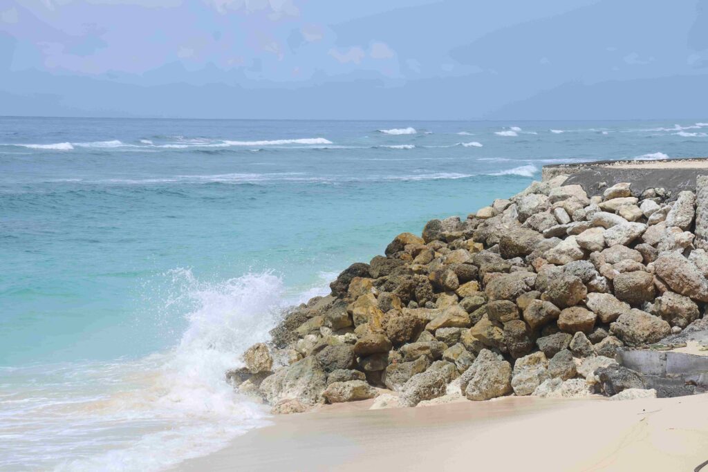 beach with wave and rocks bali melasti beach swimming bali