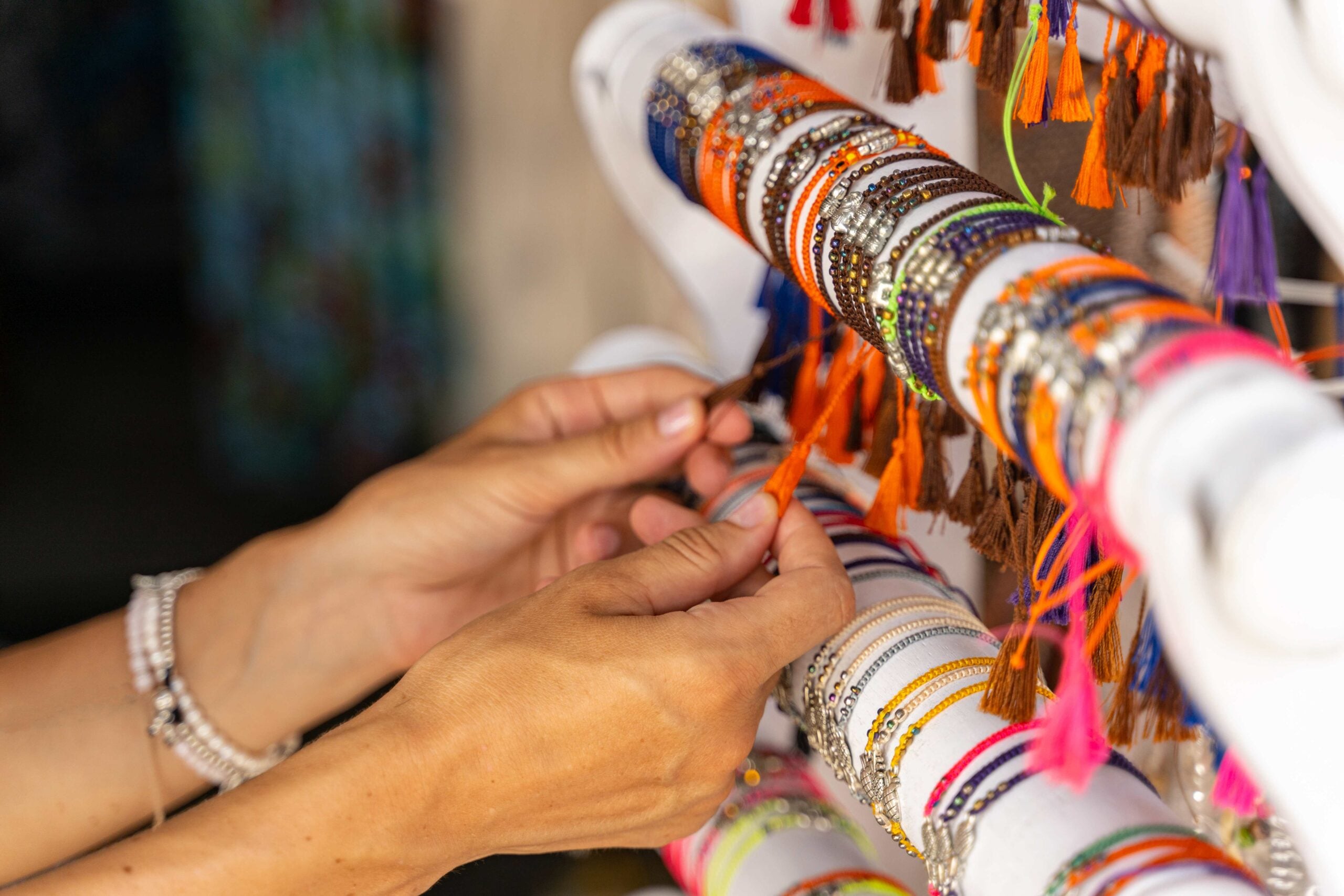 Girl purchasing local souvenirs during trip stock photo