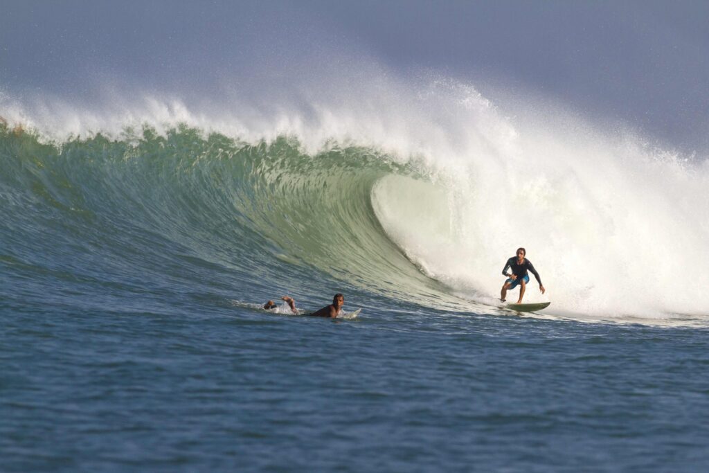 Indonesia, Bali, Surfing a wave