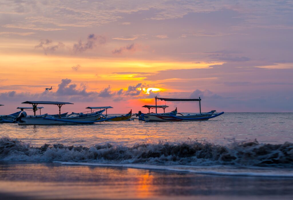 sunrise over fishing boats on Bali