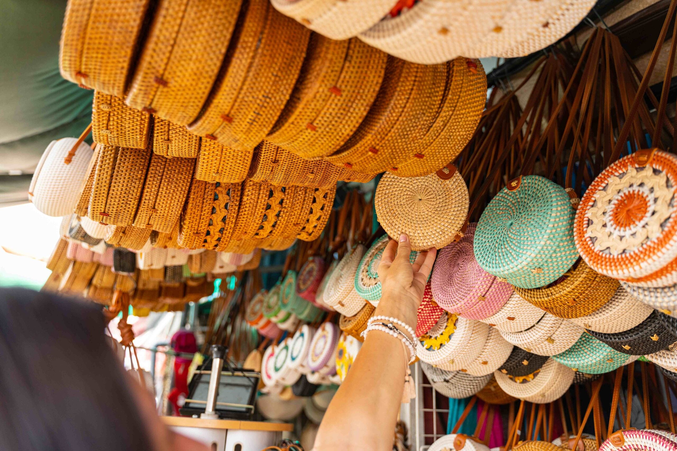 Woman choosing gifts in local market stock photo