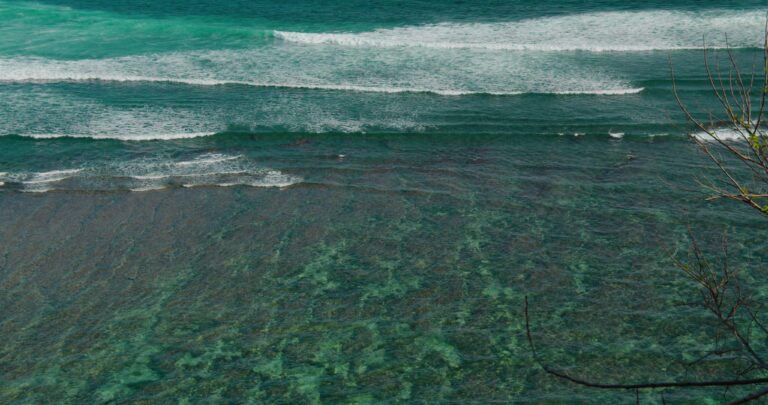 Azure pure turquoise ocean sea blue water waves foam on tropical Green Bowl Beach Bali island Indonesia Go everywhere relaxing travel concept