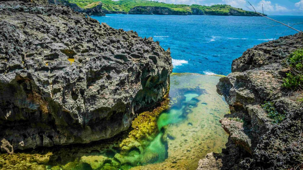 Beautiful Cliff Formation with Yellow Pool, Bizarre Place, Nusa Penida Bali Indonesia