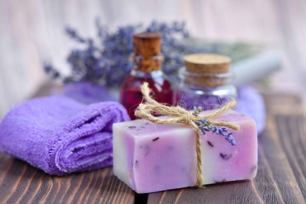 Lavender spa products on wooden table Body care products with l