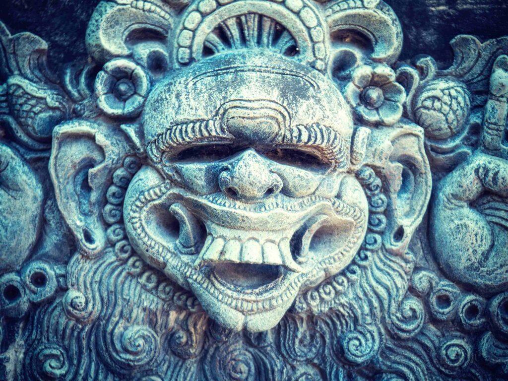 Stone sculpture on entrance door of a temple
