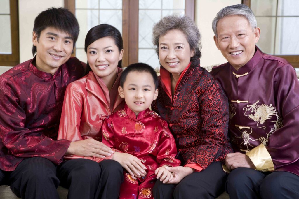 Chinese three generation family in traditional clothing