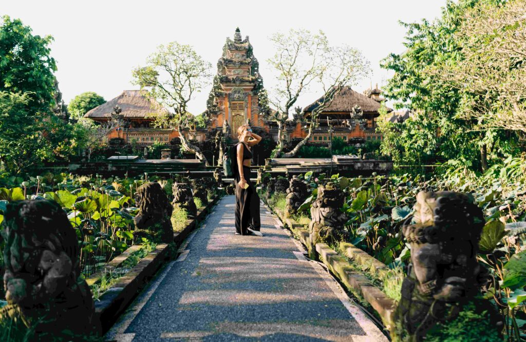 Woman admiring views near Buddhist temple in Bali
