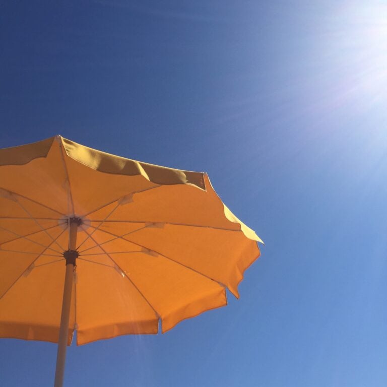 yellow beach umbrella 2023 11 27 05 05 15 utc