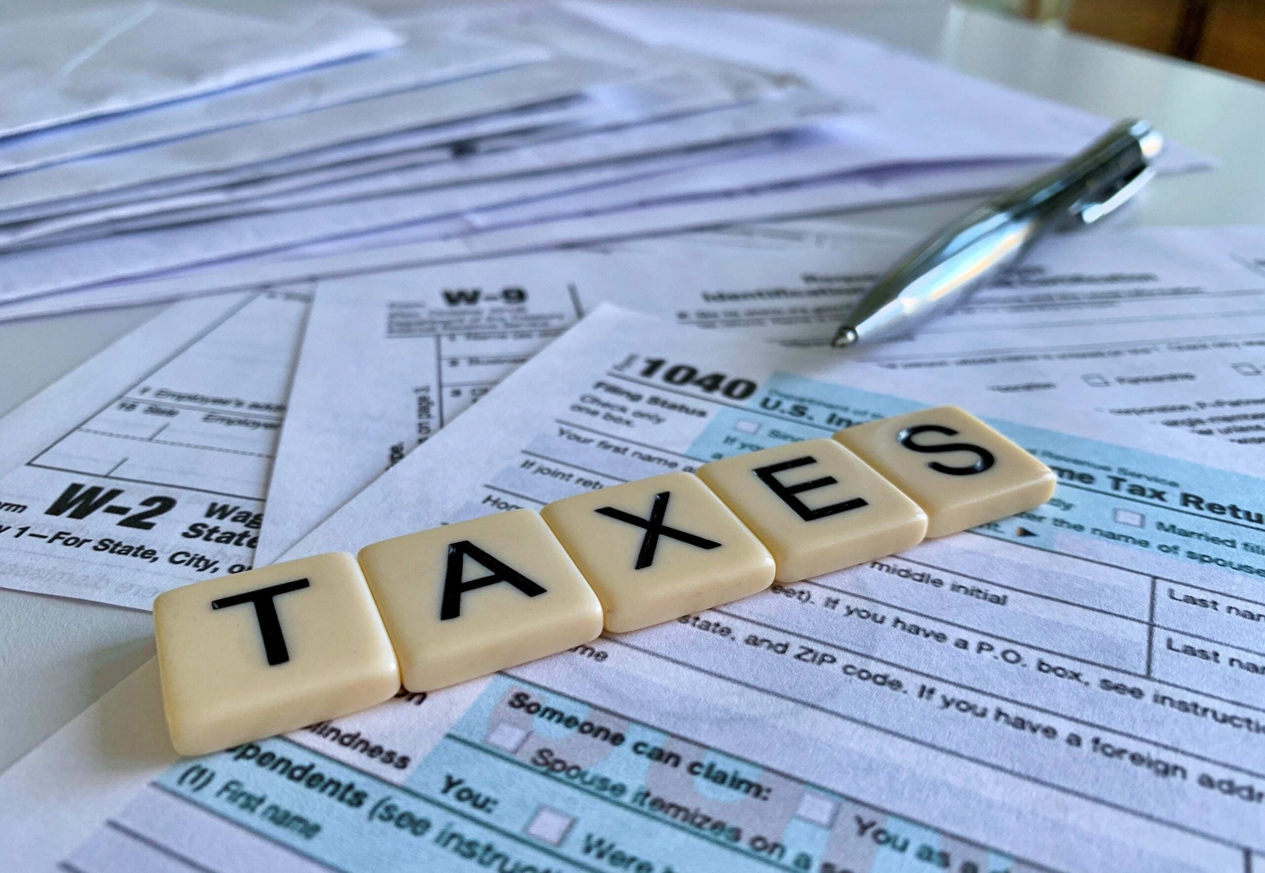 low angle of letter tiles with the word taxes on a 2023 11 27 05 19 28 utc
