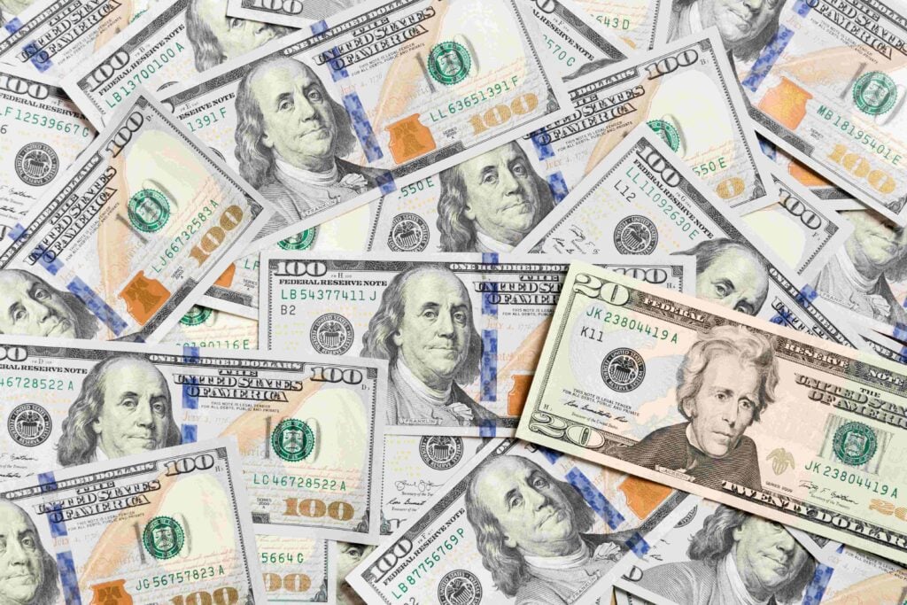 US Dollar bills one hundred dollar bills background Top view of business concept on background with copy space