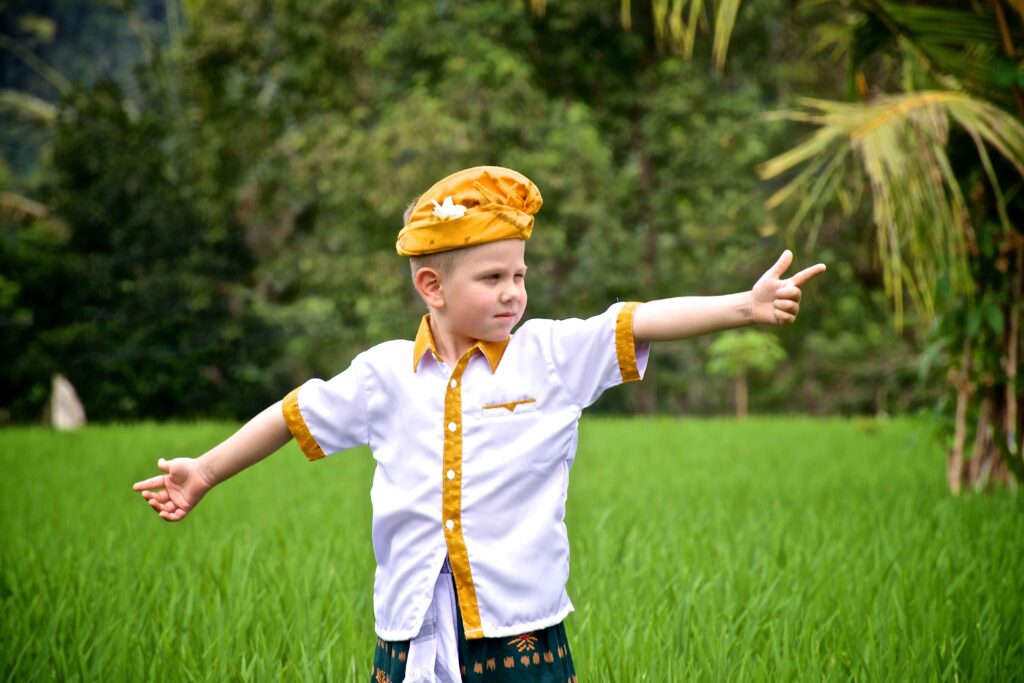 a european boy in traditional balinese clothing st 2023 11 27 05 19 33 utc (1)