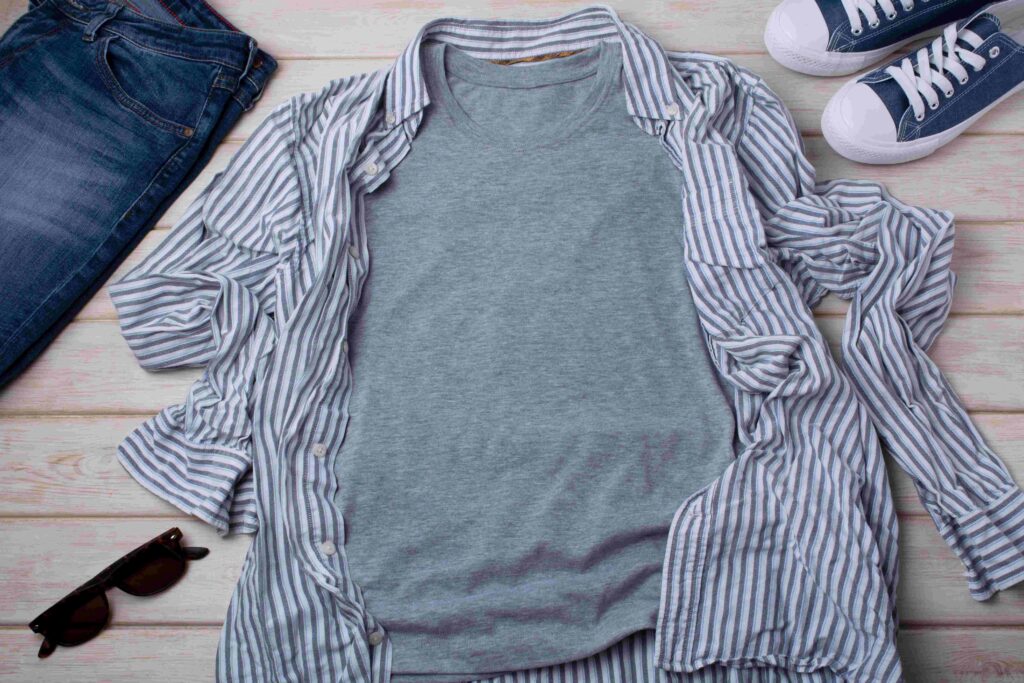 Gray T shirt mockup with striped shirt and jeans