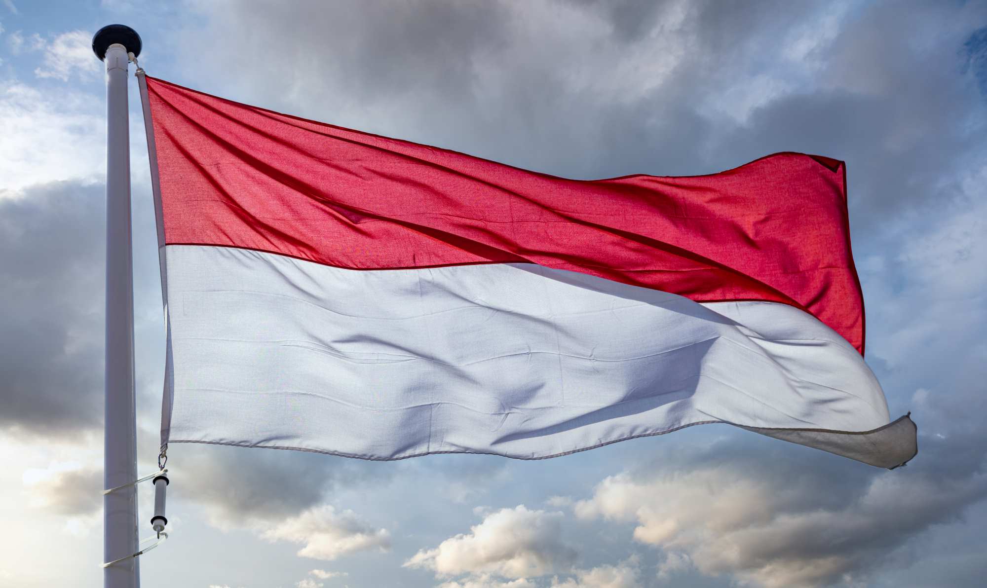 indonesia flag waving against cloudy sky 2023 11 27 04 54 16 utc