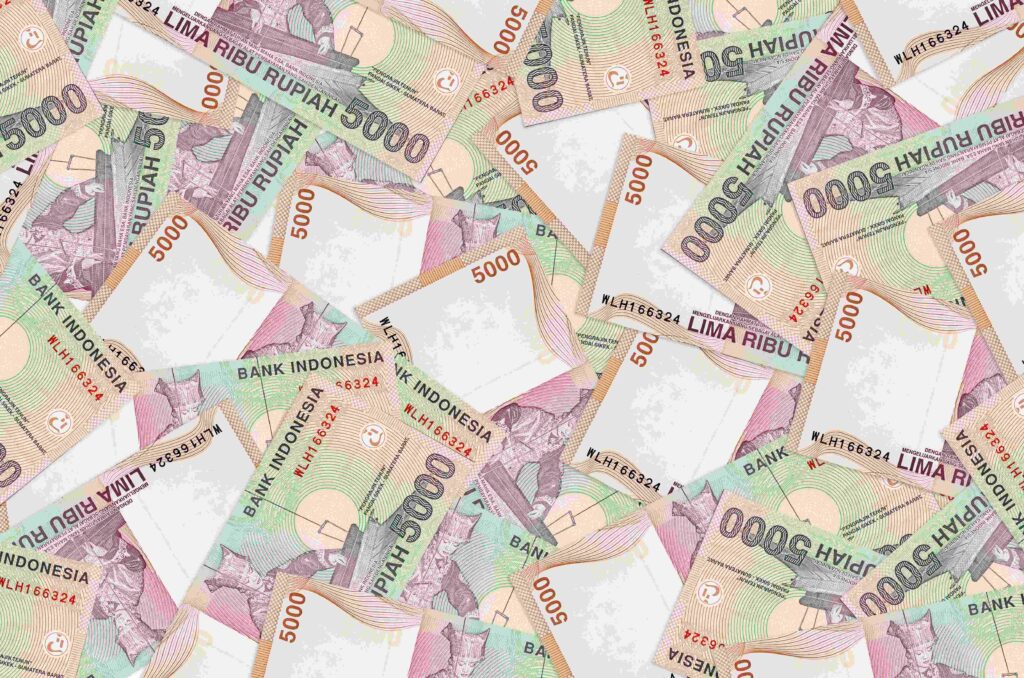 5000 Indonesian rupiah bills lies in big pile Rich life conceptual background