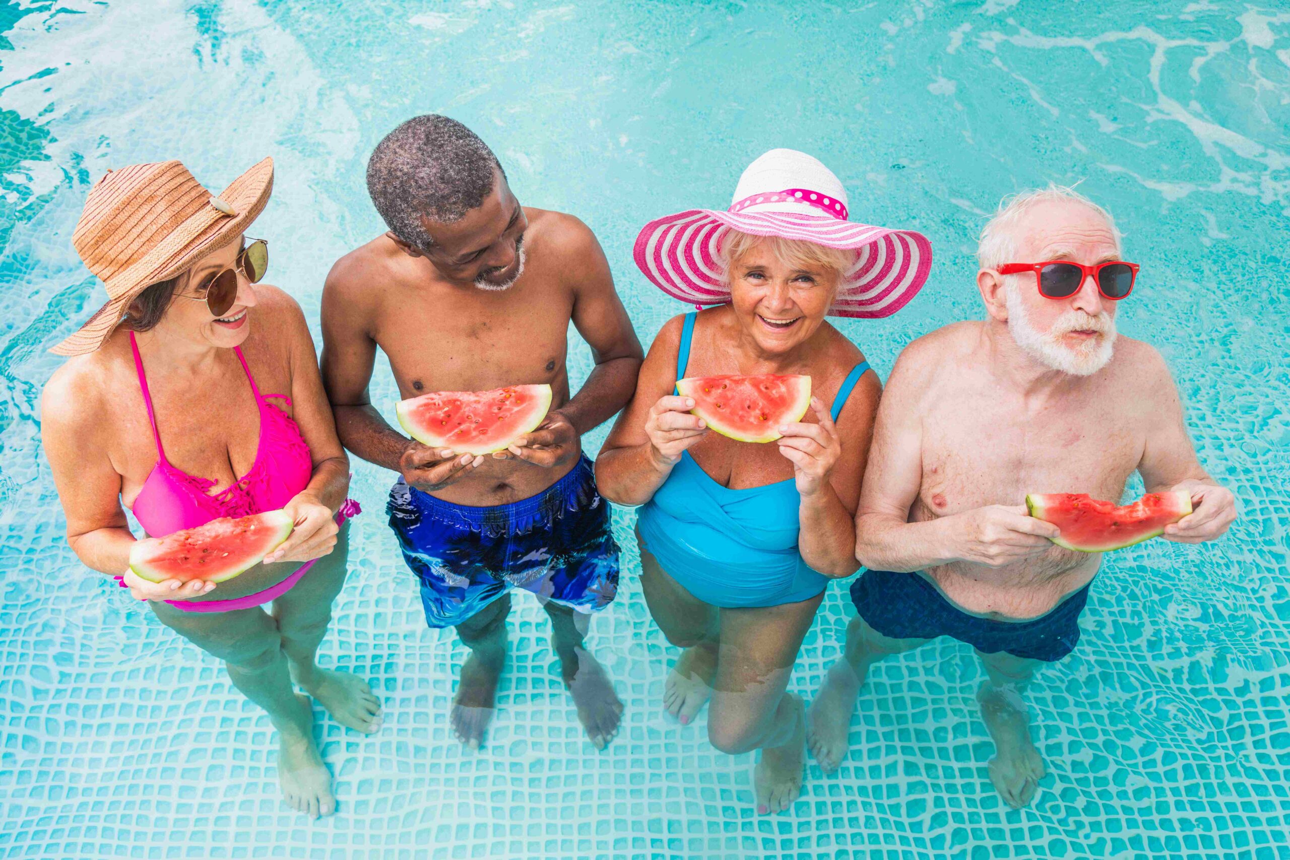 Happy seniors in the swimming pool