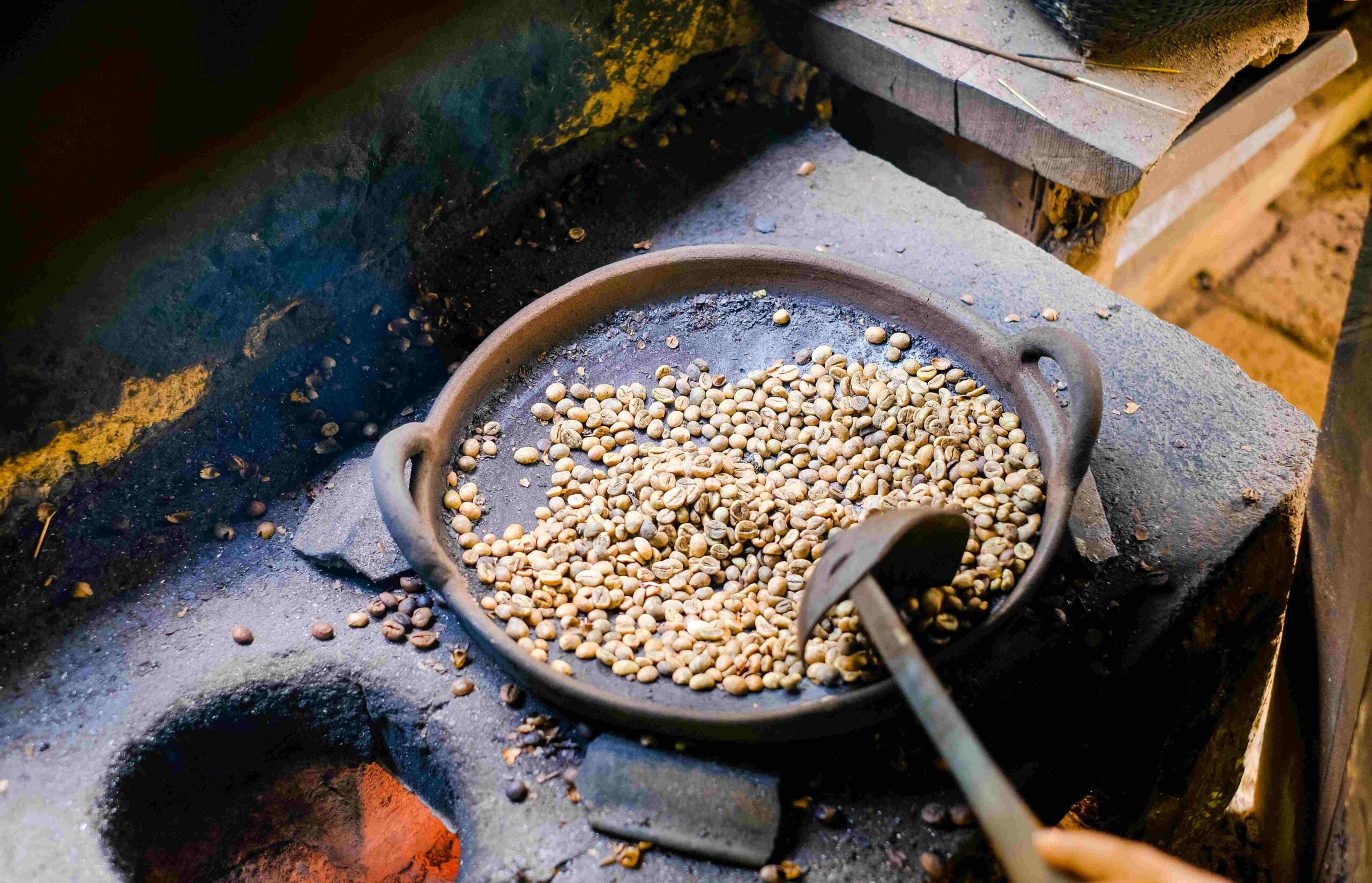 roasting coffee beans on the stove in the house 2023 11 27 05 07 18 utc