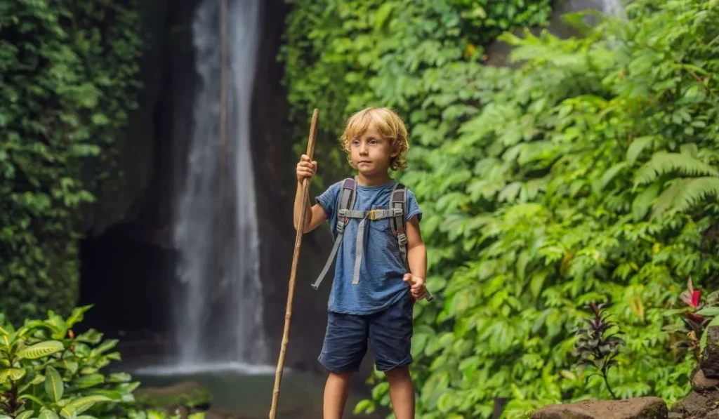 A little boy at Jagasatru Waterfall
