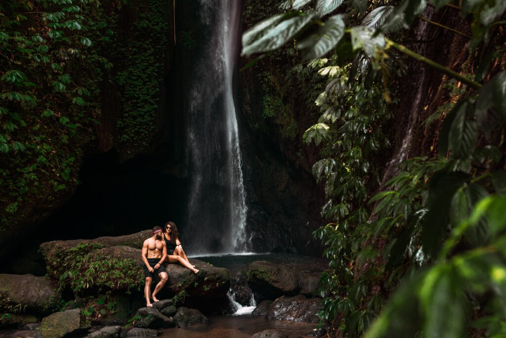 a couple in love on a waterfall honeymoon trip h 2023 11 27 05 09 17 utc