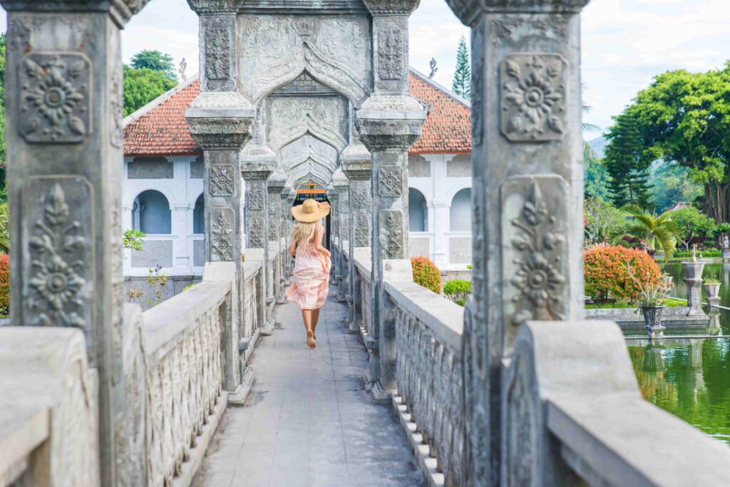 Beautiful girl at Water Palace in Bali