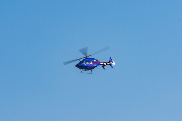 Helicopter flying in the sky during a sunny day