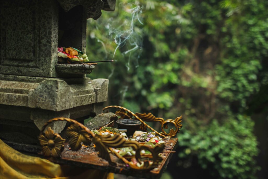 Traditional balinese Canang Sari offerings to gods and spirits w
