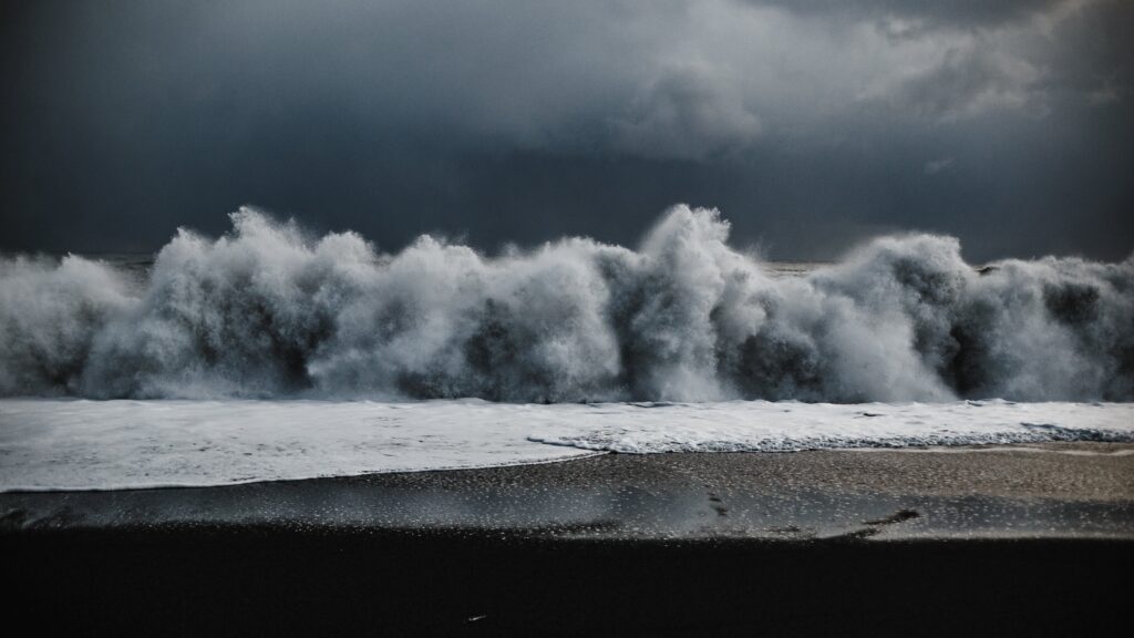 Beautiful shot of large crashing waves at the beach