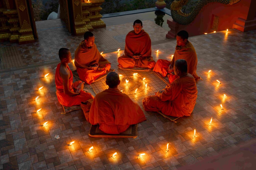 close up group of young and senior monk sit in a c 2023 11 27 05 03 05 utc