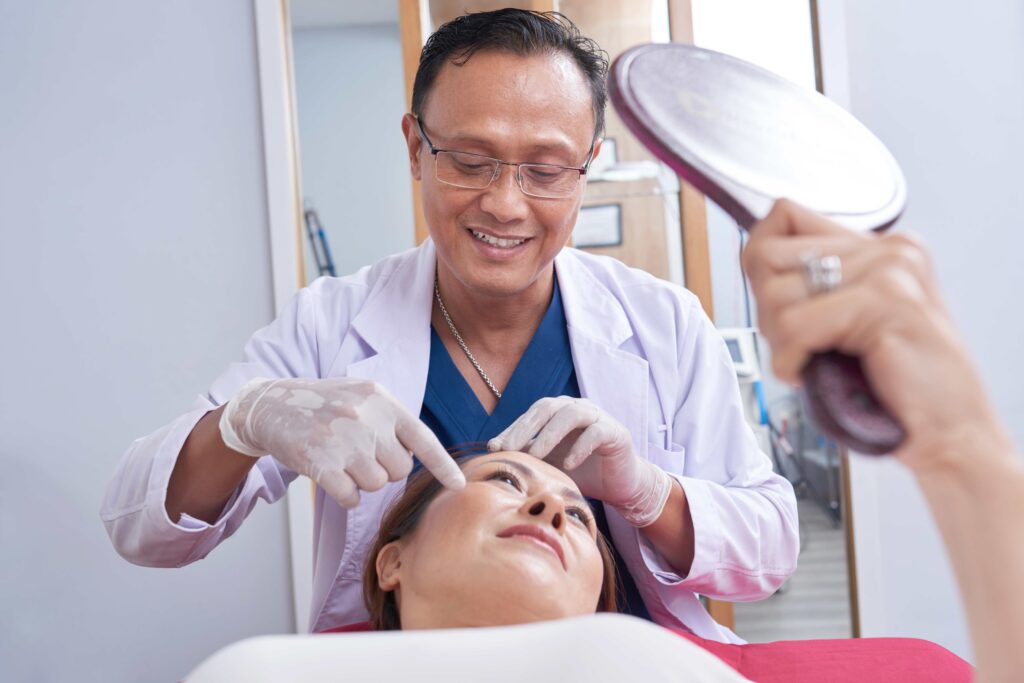 Doctor consults patient about skin