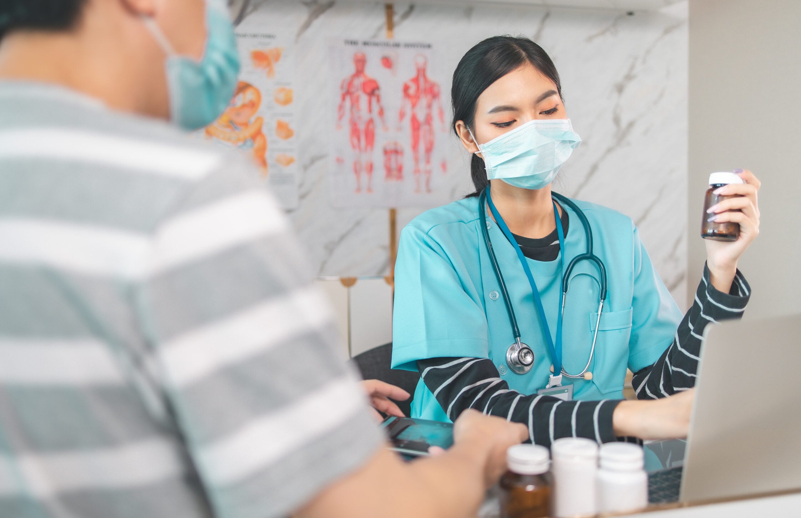Medicine and health care concept Asian woman doctor is taking