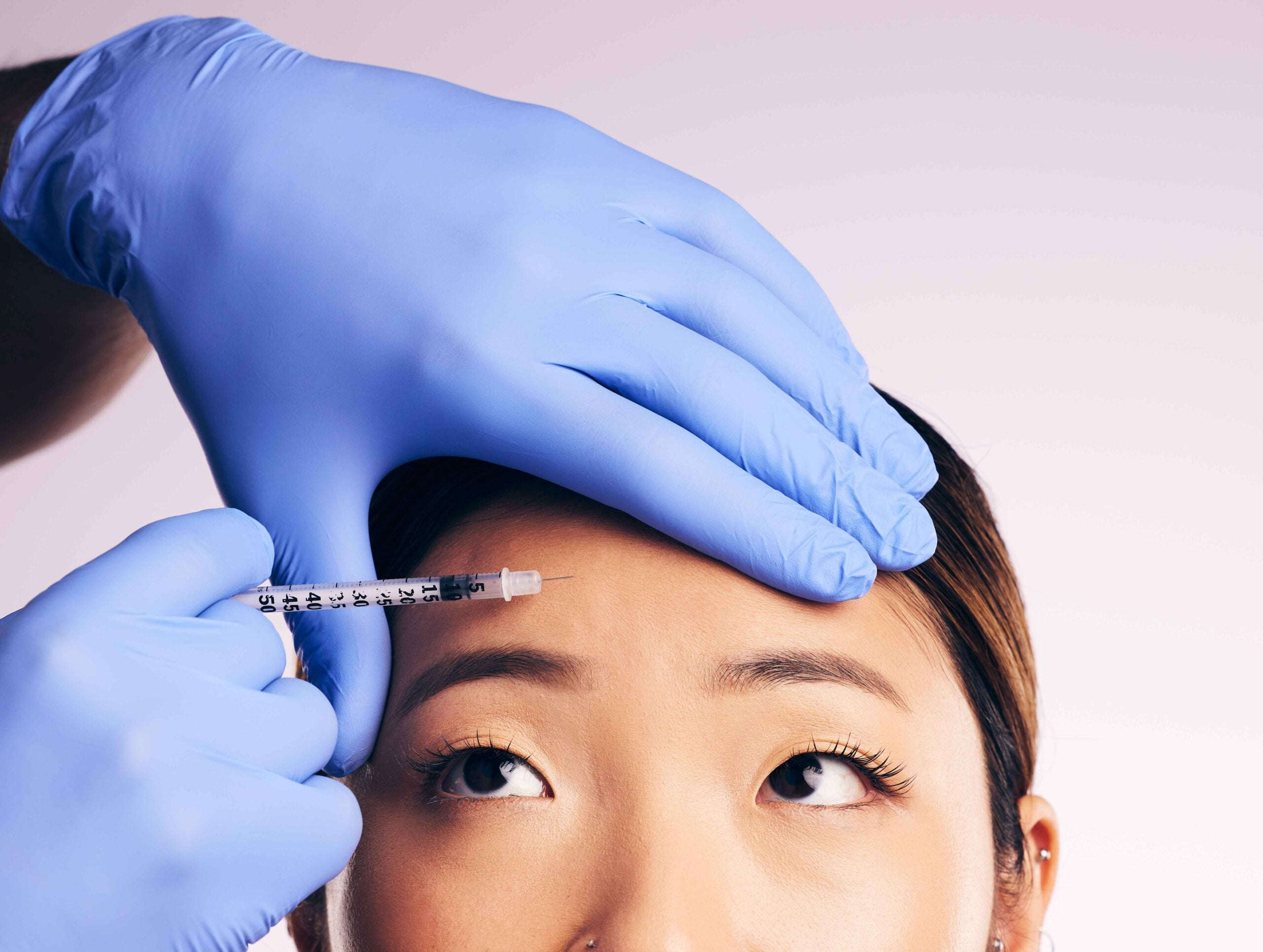 face skincare forehead injection and asian woman 2023 11 27 04 53 11 utc