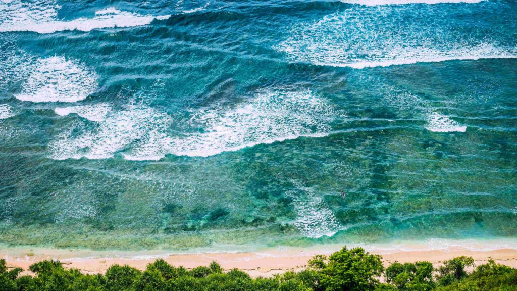 Top Aerial view of Nunggalan Beach near Uluwatu, Bali, Indonesia