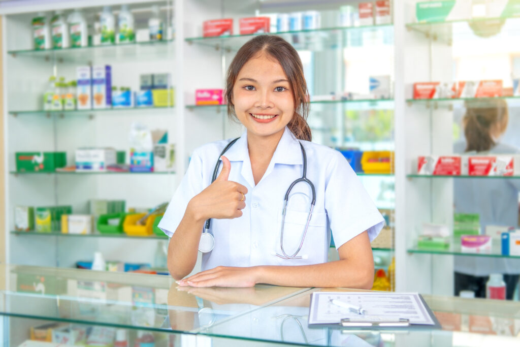 Young asian pharmacist work at the pharmacy