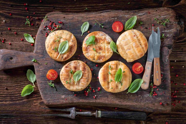 Hot roasted halloumi cheese with cherry tomatoes and basil