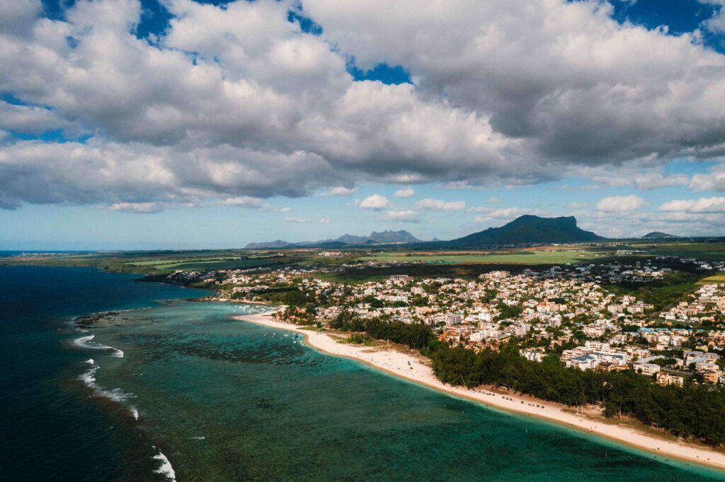 On the beautiful beach of the island of Mauritius along the coast Shooting from a bird's eye view of the island of Mauritius