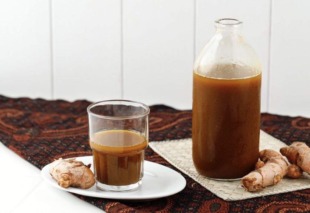 Turmeric and Tamarind Drink or Kunyit Asam, Indonesian Traditional Herbal Beverage