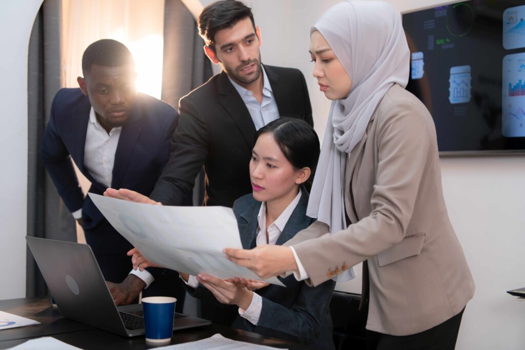 Multiethnic group of business people working together in a moder