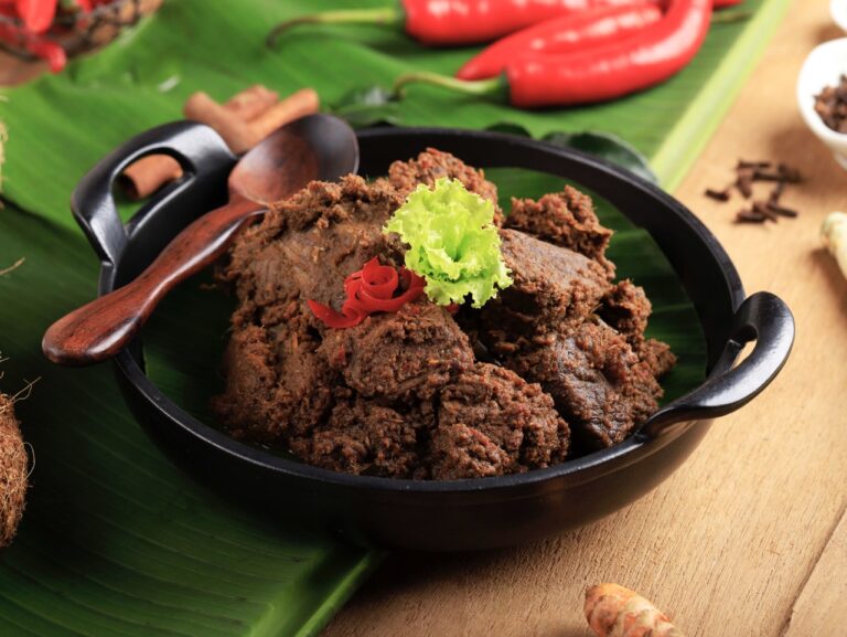 Selected Focus Rendang or Randang is The Most Delicious Food in the World Made from Beef Stew and Coconut Milk with Various Herbs and Sice Typically food from Minang Tribe, West Sumatera, Indonesia