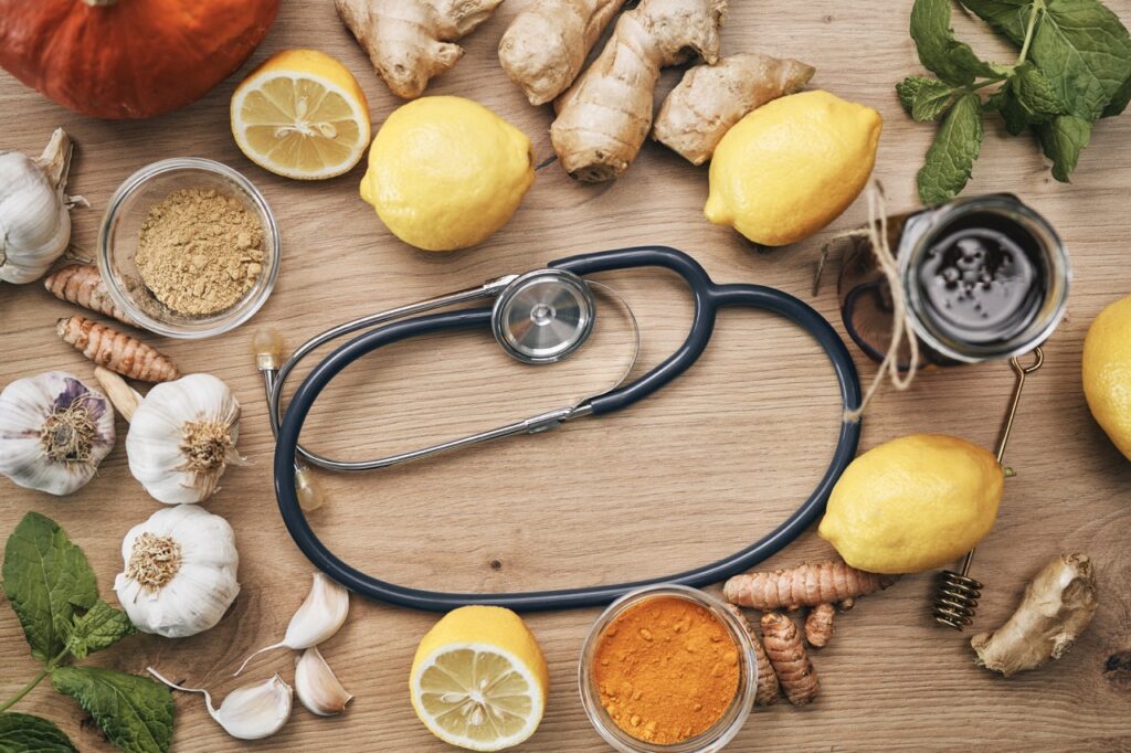 Top view of natural immune ingredients and medical stethoscope