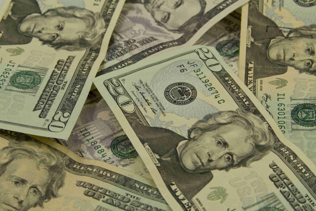 Closeup shot of 20 dollar bills for wallpaper and background