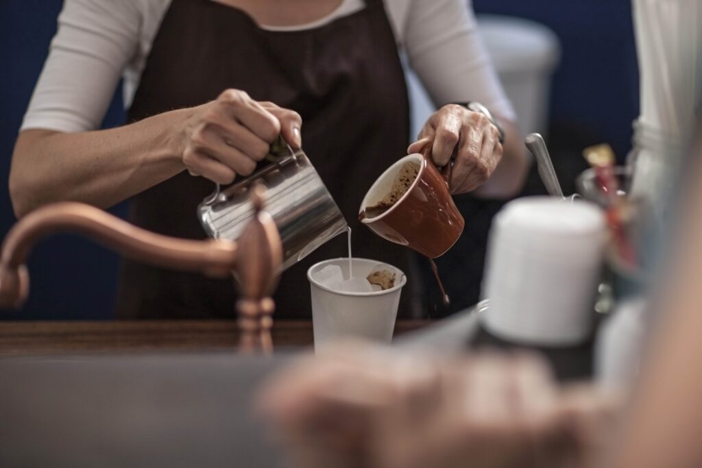 Barista preparing iced coffee