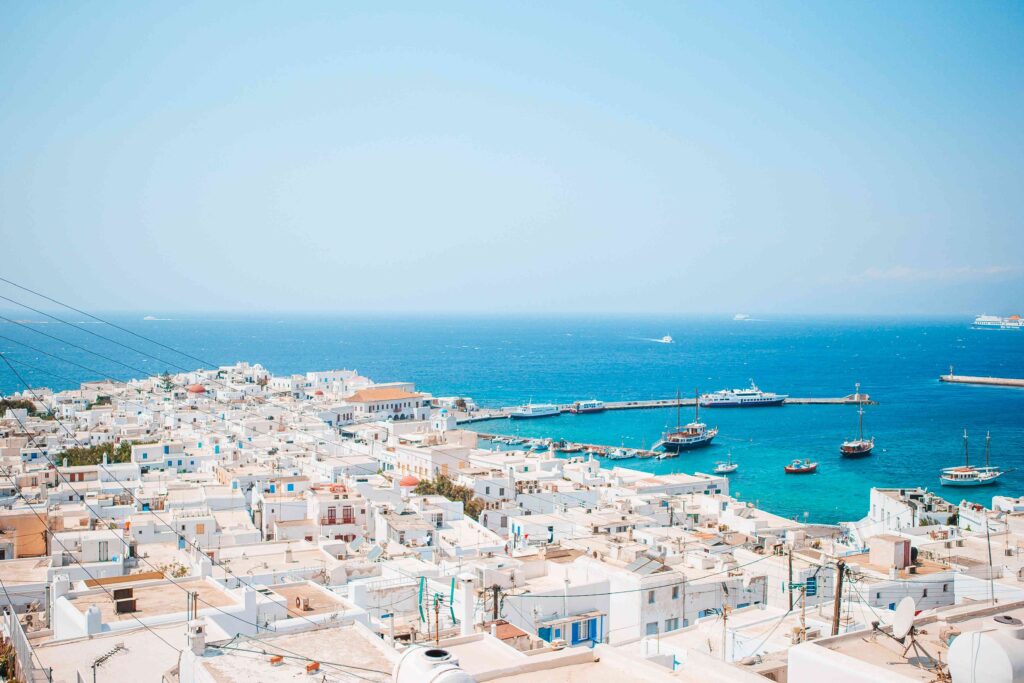 View of traditional greek village with white houses on Mykonos Island, Greece,