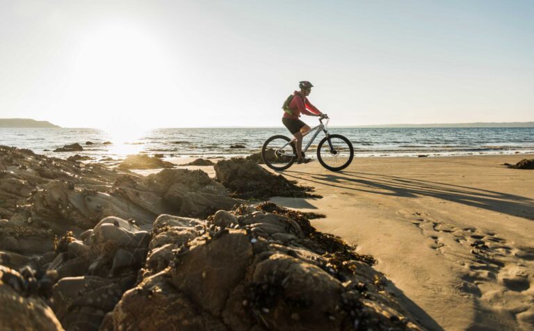 france crozon peninsula man biking on the beach 2024 09 16 07 56 03 utc