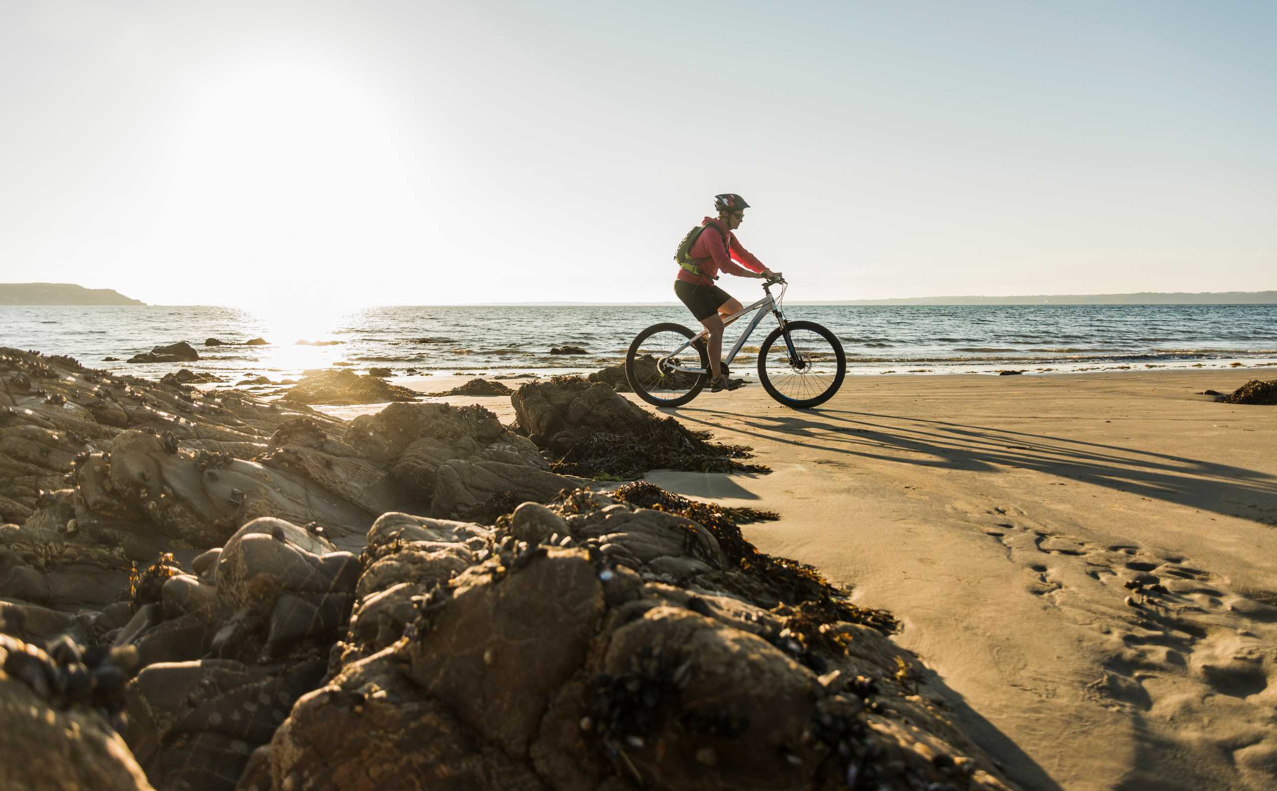 france crozon peninsula man biking on the beach 2024 09 16 07 56 03 utc
