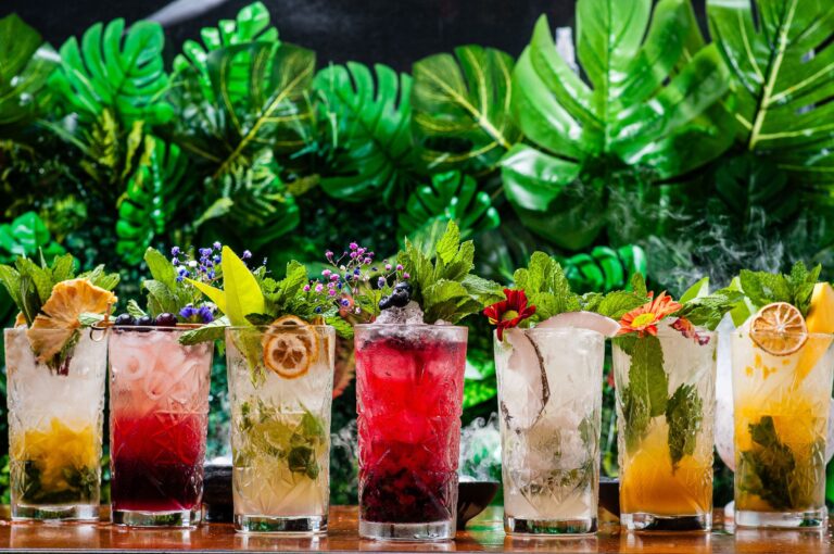 Herb and flower garnished cocktails