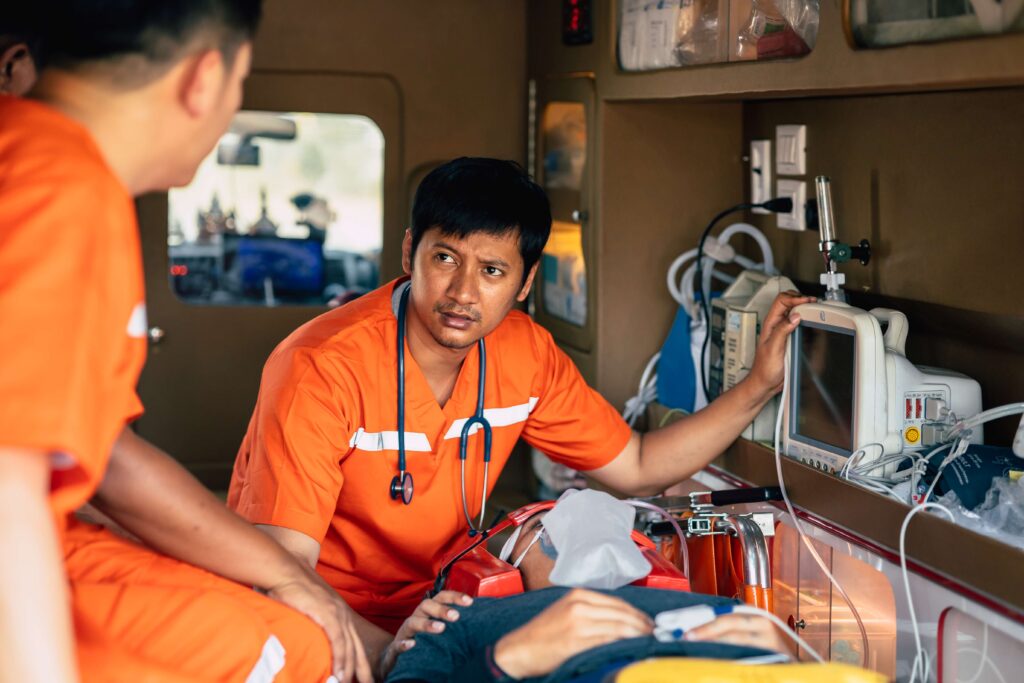 Paramedics Providing Emergency Medical Assistance in an Ambulance